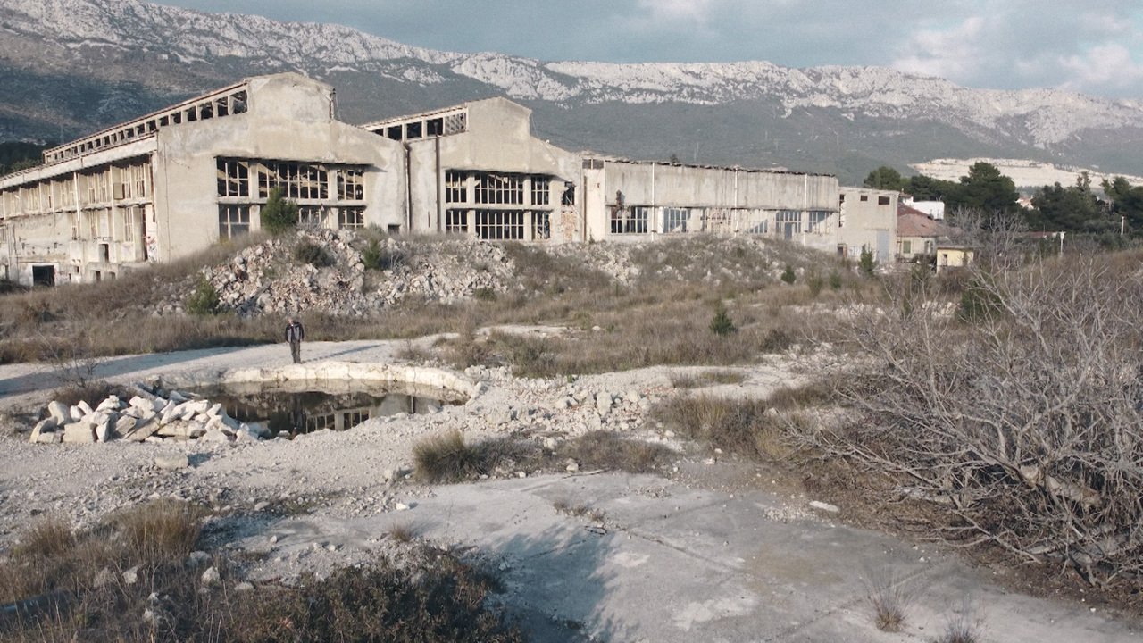 An abandoned industrial building on the coast