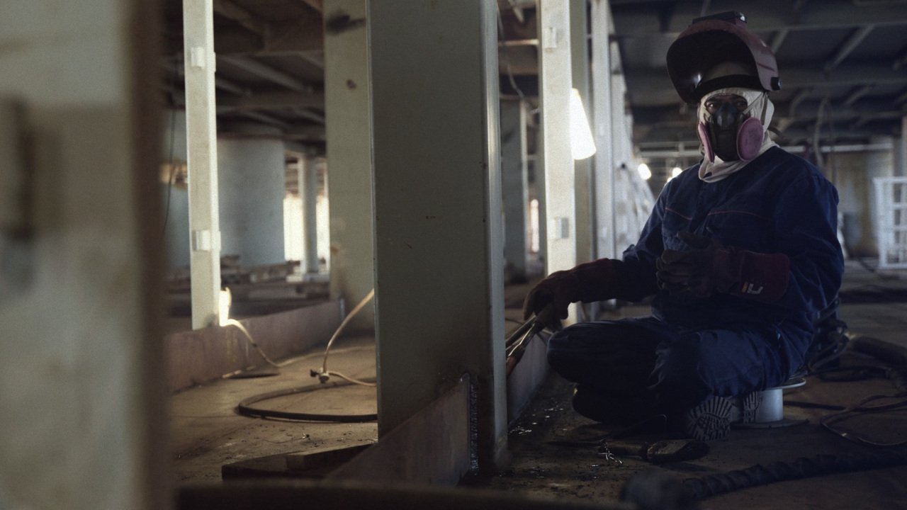 A shipyard worker inside a vessel